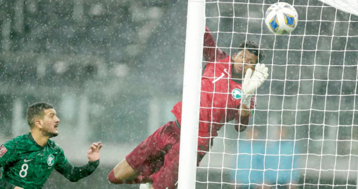 رينارد أشاد بتألق الربيعي في ظهوره الأول مع المنتخب الأول (أ.ب)