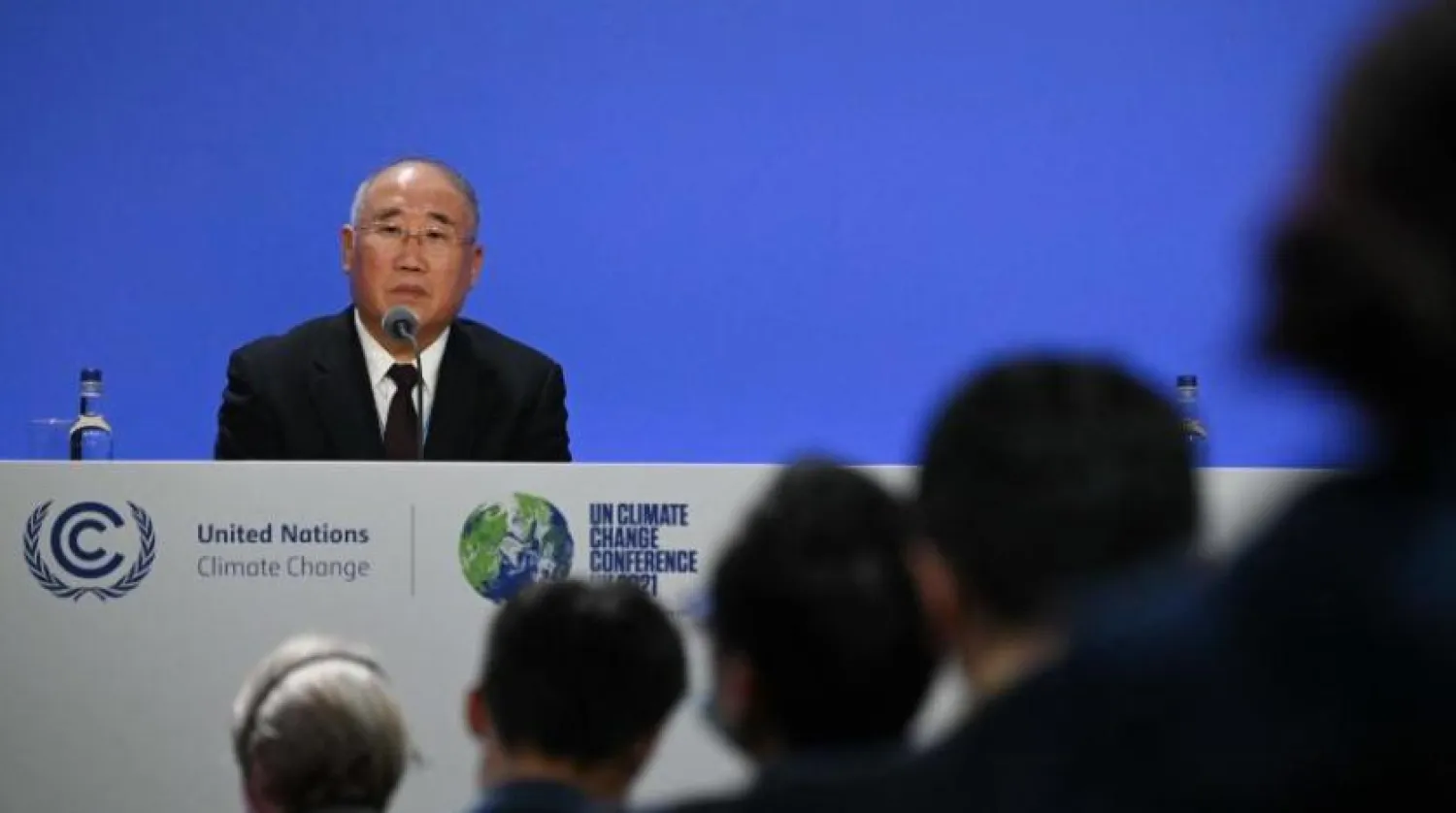 Çin iklim elçisi Şie Shenhua, Glasgow'da iklim krizi konusunda ABD ile ortak bir açıklama yaptı (AFP)