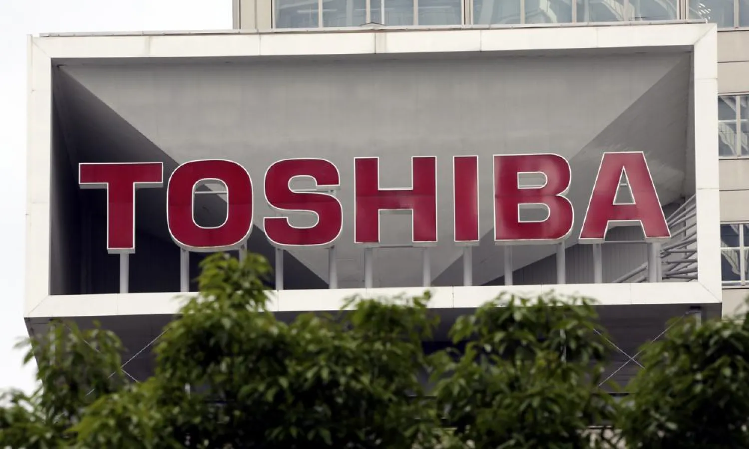 FILE - This photo shows the company logo of Toshiba Corp. displayed in front of its headquarters in Tokyo on May 26, 2017. (AP Photo/Koji Sasahara, File)
