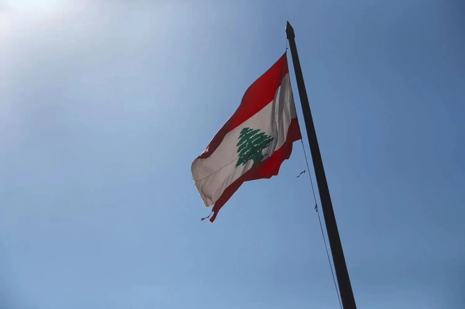 The Lebanese national flag flutters in Beirut, Lebanon, August 18, 2020. (Reuters)