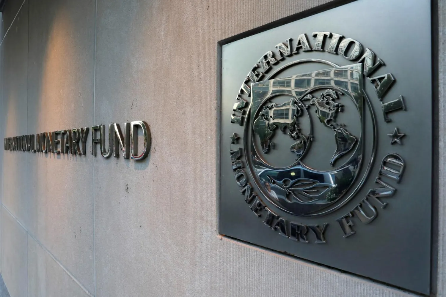 FILE PHOTO: International Monetary Fund (IMF) logo is seen outside its headquarters in Washington, September 4, 2018. REUTERS/Yuri Gripas/File Photo