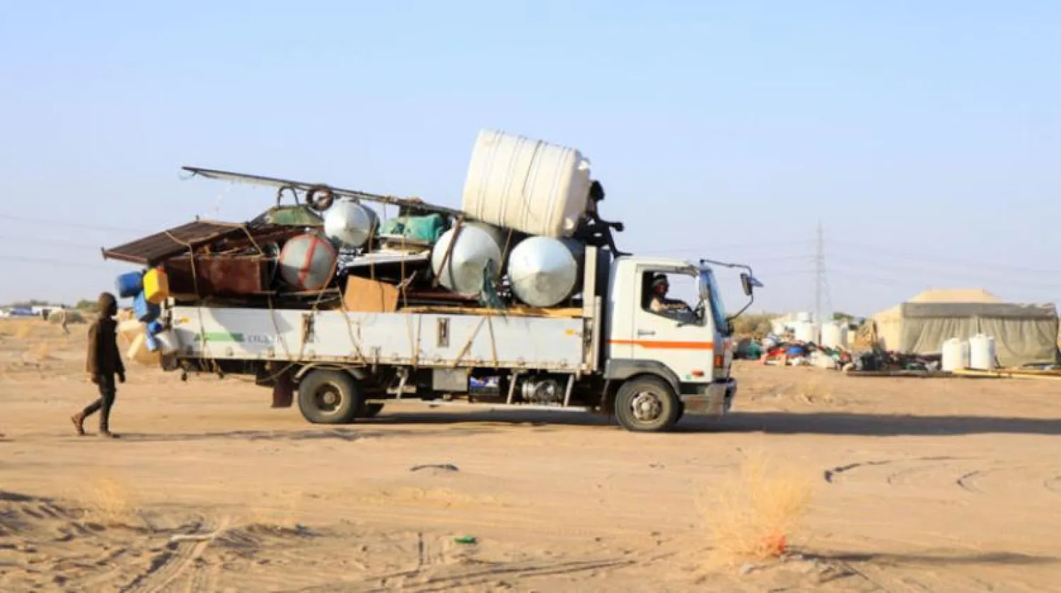 Truck carrying furniture and refugees’ belongings heading to a refugee camp in Marib (Reuters)
