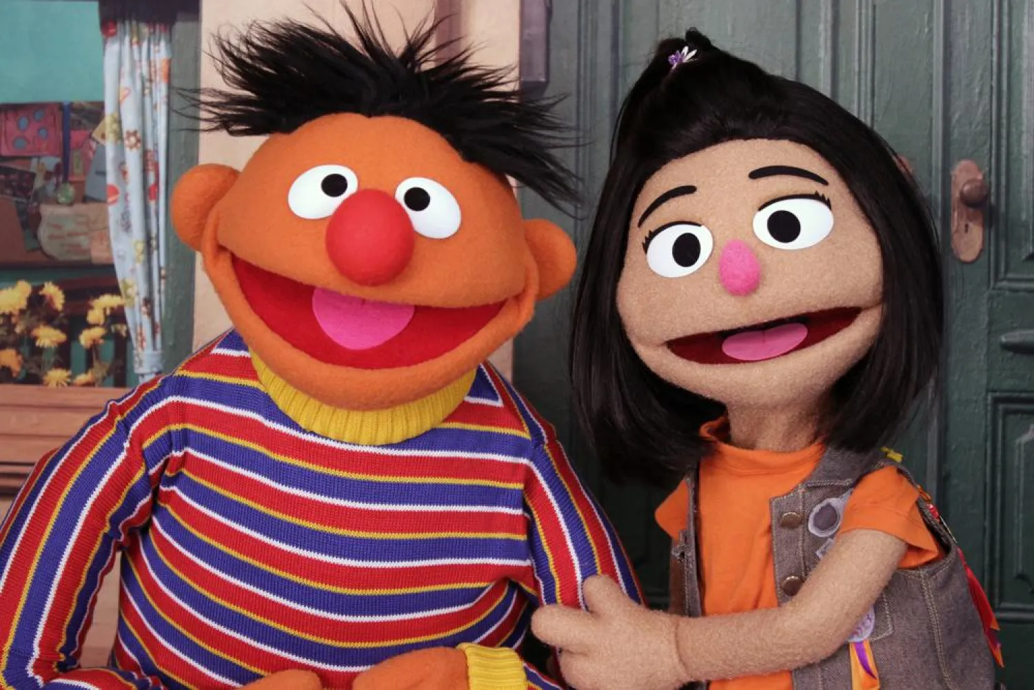 Ernie, a muppet from the popular children's series "Sesame Street," appears with new character Ji-Young, the first Asian American muppet, on the set of the long-running children's program in New York on Nov. 1, 2021. (AP)