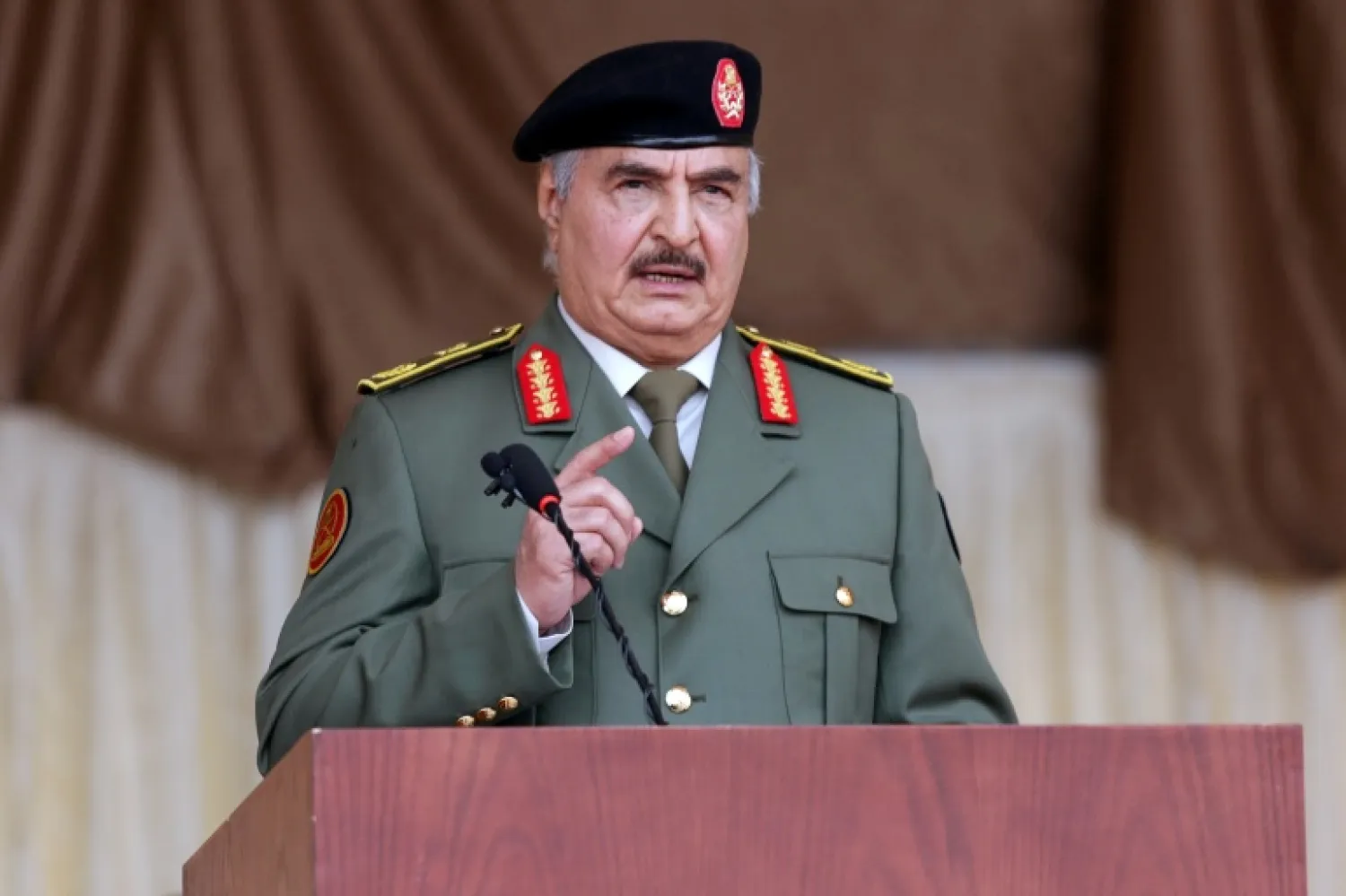 Libya’s Field Marshal Khalifa Haftar gestures as he speaks in Benghazi, Libya December 24, 2020. REUTERS/Esam Omran Al-Fetori/File Photo

