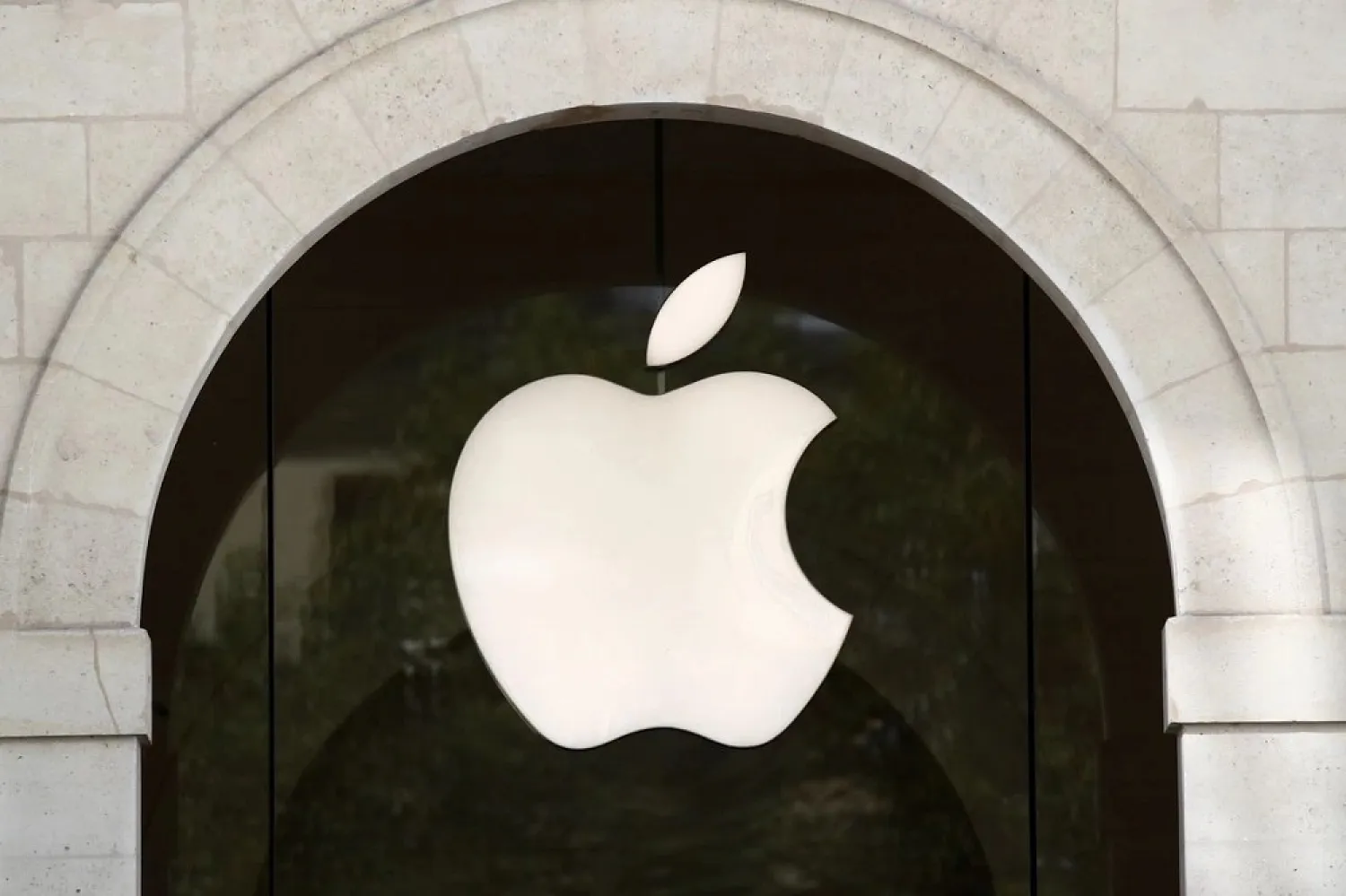 An Apple logo is pictured in an Apple store in Paris, France September 17, 2021. (Reuters)