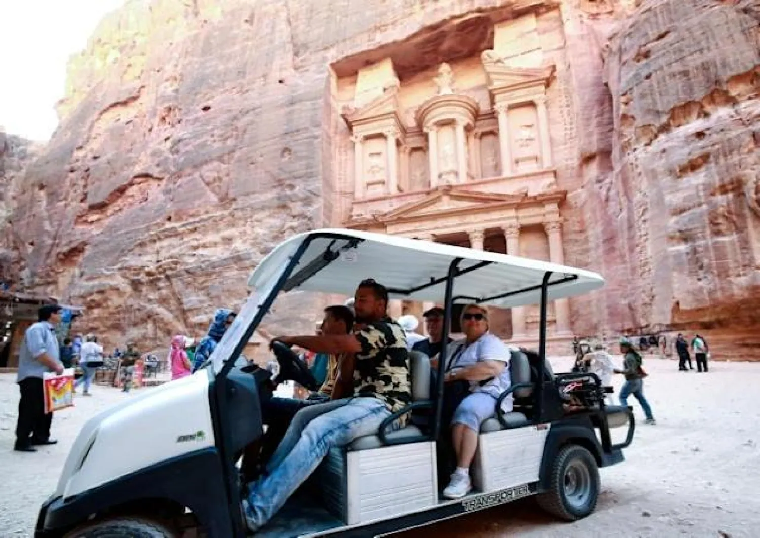 Electric carts have replaced more traditional animal-powered carriages in Petra. (AFP/Khalil MAZRAAWI)