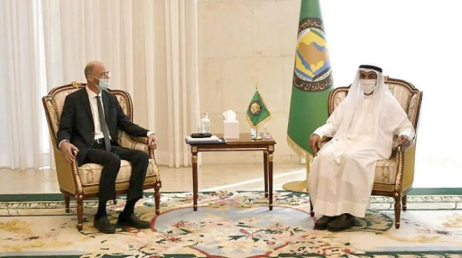 GCC Secretary-General Nayef al-Hajraf and US Envoy on Iran Robert Malley (Asharq Al-Awsat)
