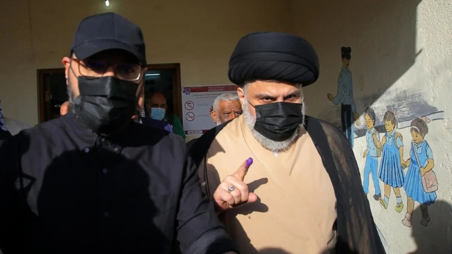 Sadr after casting his vote in this year's parliamentary elections. (AP)