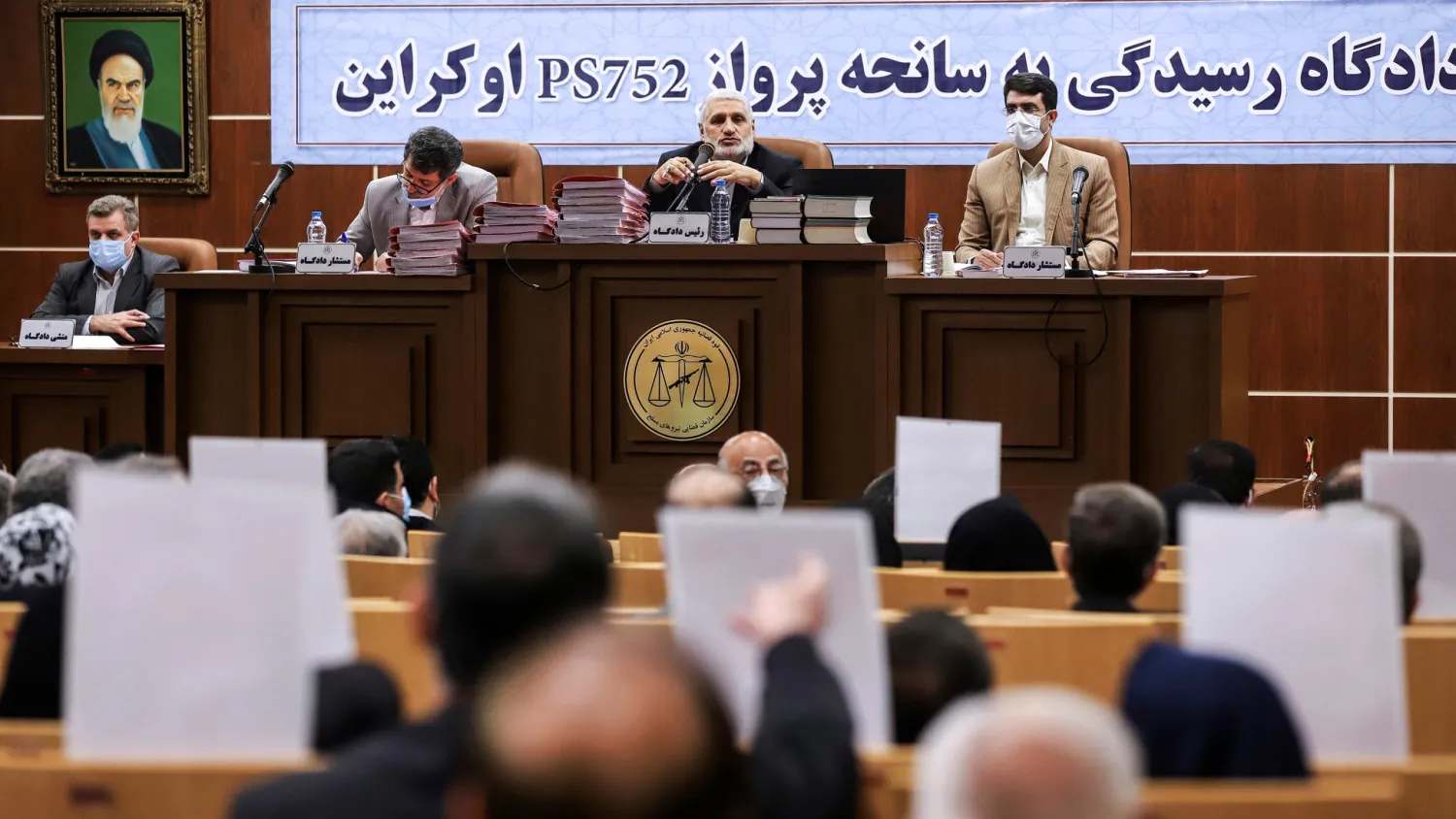 This photo released by Mizan News Agency, shows a hearing in an Iranian military courtroom for the 2020 downing of a Ukrainian plane that killed 176 people, Sunday, Nov. 21, 2021, in Tehran, Iran. (Koosha Mahshid Falahi/Mizan News Agency via AP)