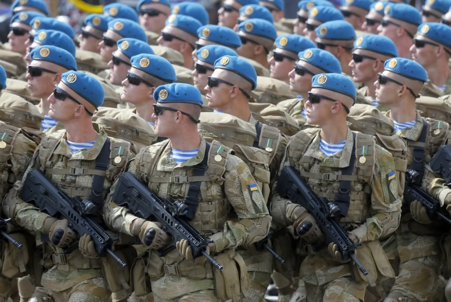 File-This Aug. 24, 2017, file photo shows Ukrainian soldiers marching along main Khreshchatyk Street during a military parade to celebrate Independence Day in Kiev, Ukraine. (AP Photo/Efrem Lukatsky, File)
