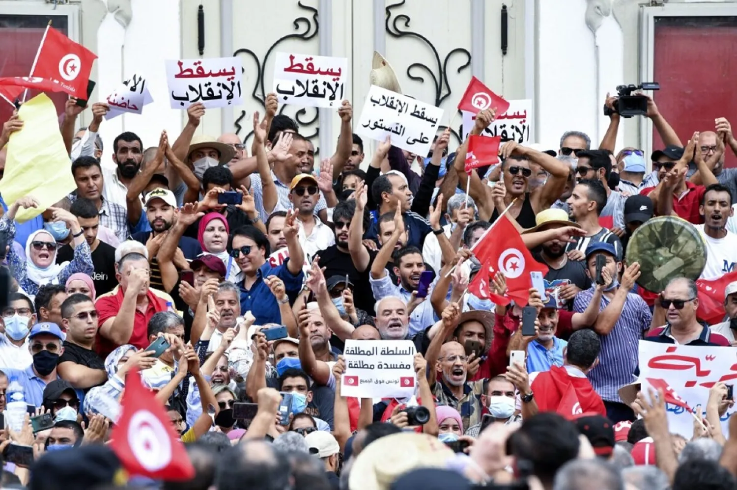Tunisian demonstrators shout slogans against President Kais Saied. (AFP via Getty Images)