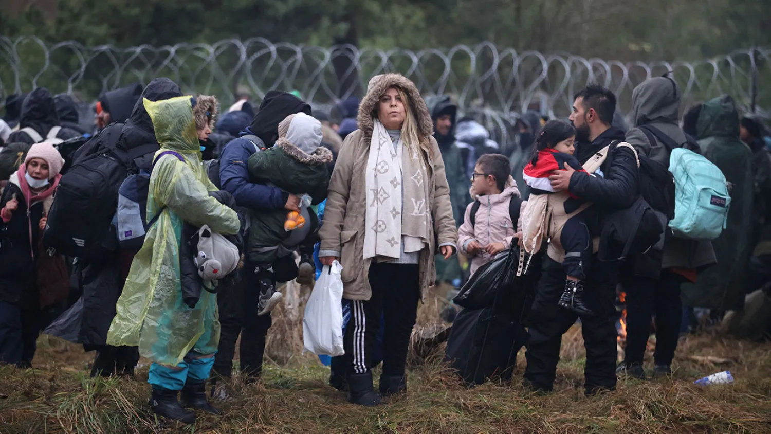 Migrants at the Belarusian-Polish border in the Grodno region. Leonid Shcheglov / BELTA / AFP
