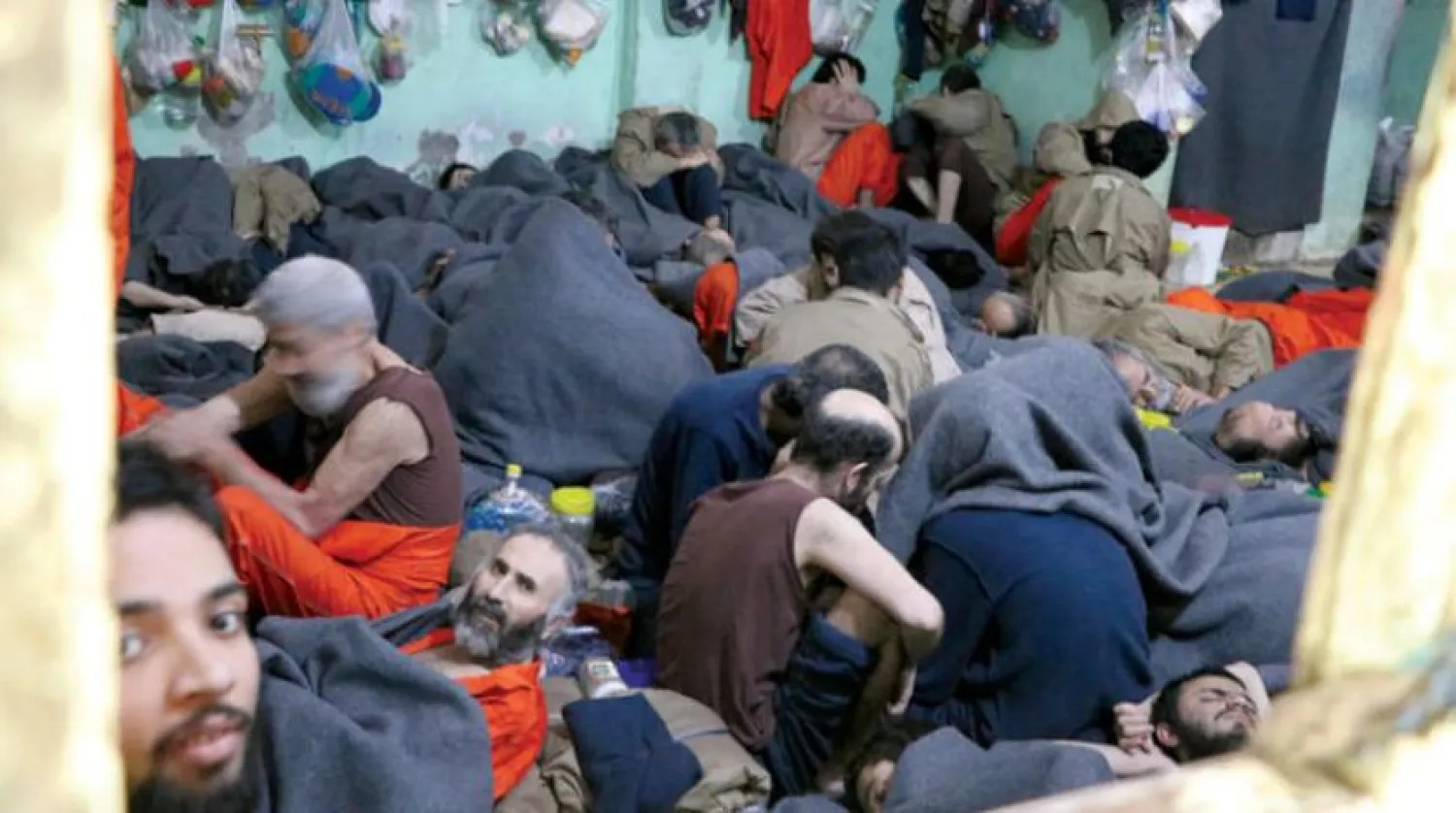 Prisoners accused of belonging to ISIS in Hasakah governorate, northeastern Syria (Asharq Al-Awsat)
