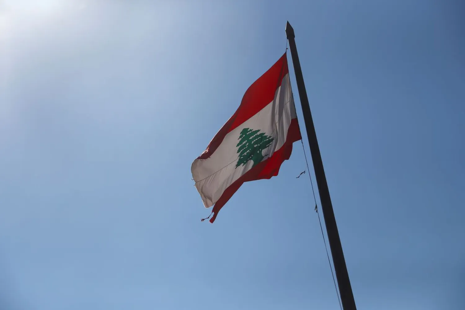 Lebanese national flag flutters in Beirut, Lebanon, August 18, 2020. REUTERS/Hannah McKay
