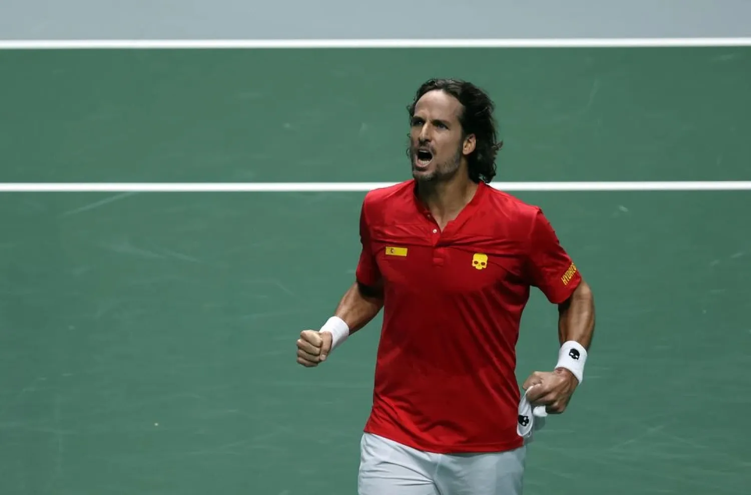 Spain's Feliciano Lopez celebrates after winning his match against Ecuador's Roberto Quiroz. (Reuters)