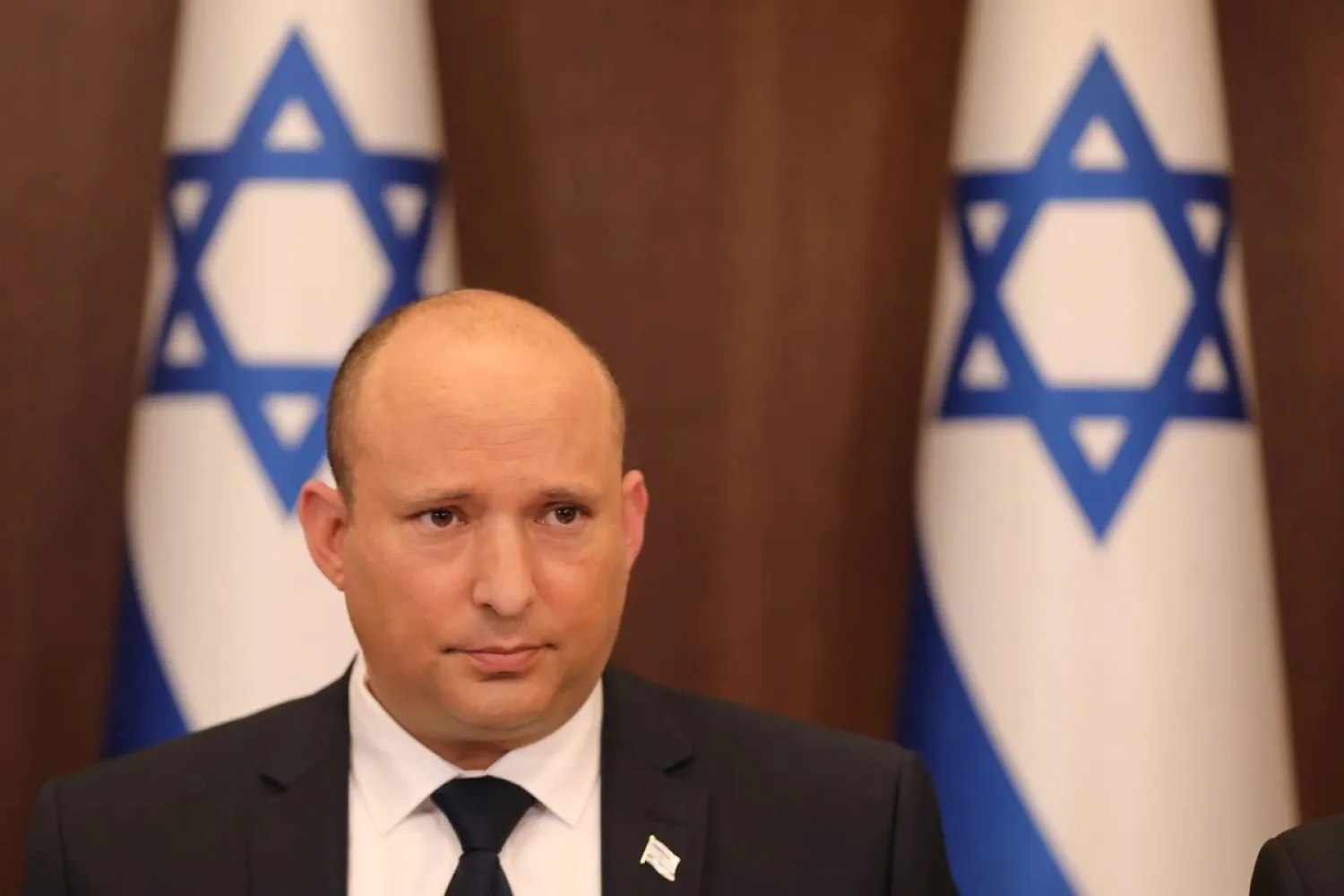 Israeli Prime Minister Naftali Bennett attends a cabinet meeting at the Prime Minister's office in Jerusalem, November 21, 2021. (Reuters)