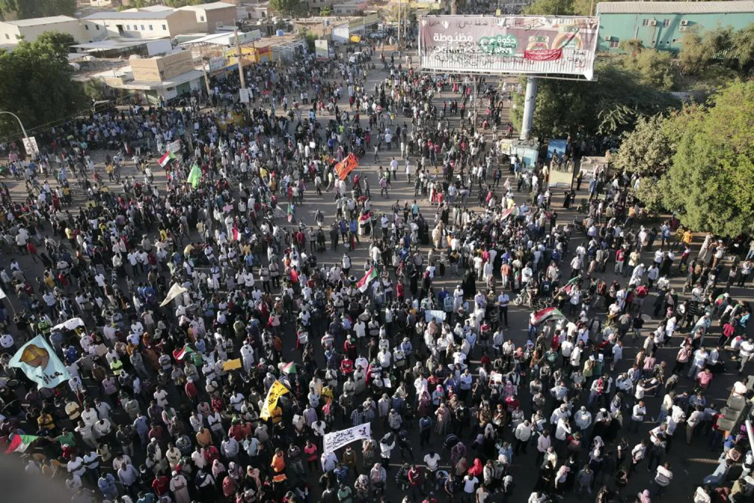 Thousands of protesters take to the streets to renew their demand for a civilian government in the Sudanese capital Khartoum, Nov. 25, 2021. (AP)