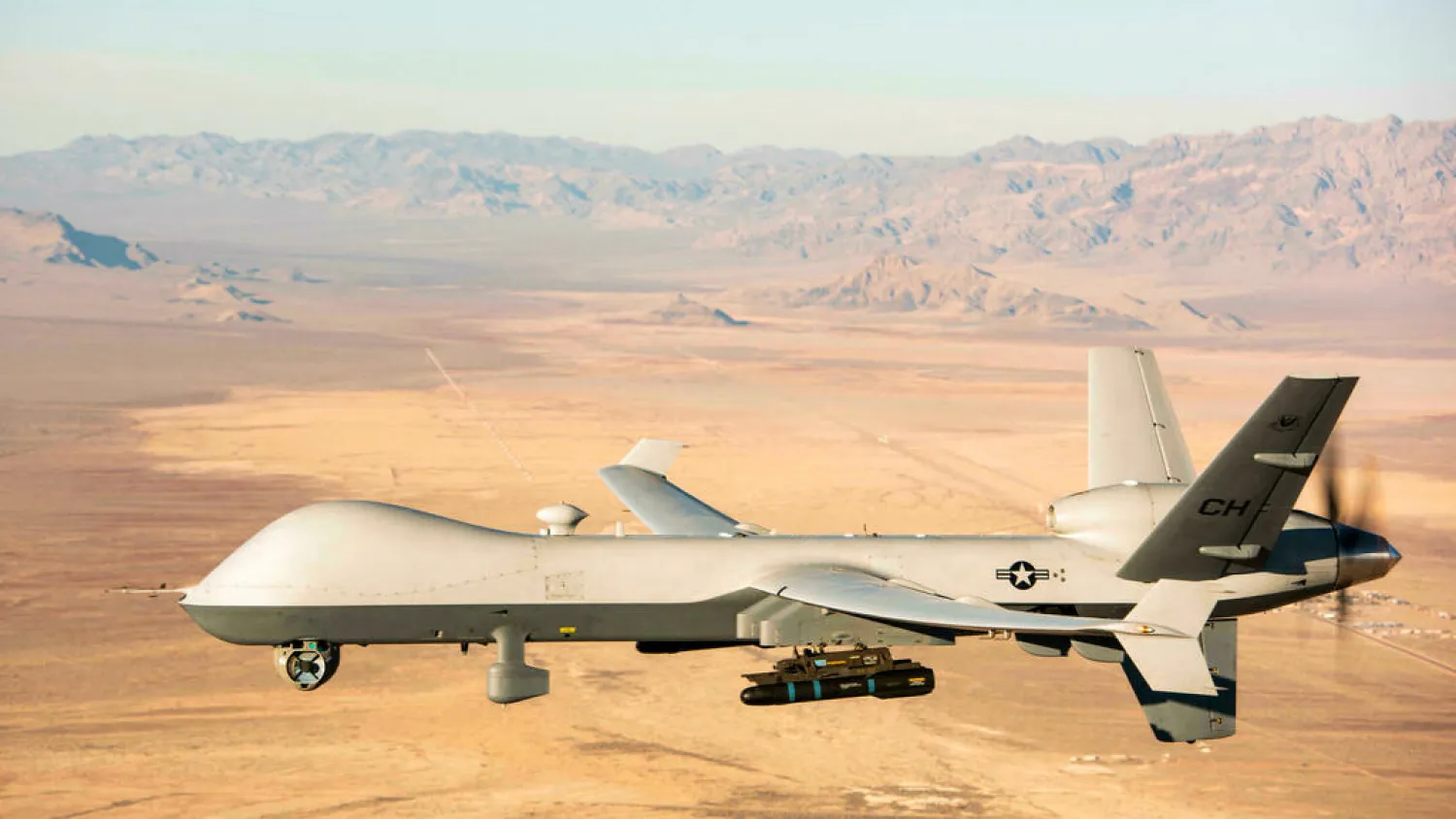 This US Air Force handout photo shows an MQ-9 Reaper unmanned aerial vehicle (UAV or drone) flying over the Nevada Test and Training Range on January 14, 2020.  © William Rosado, AFP