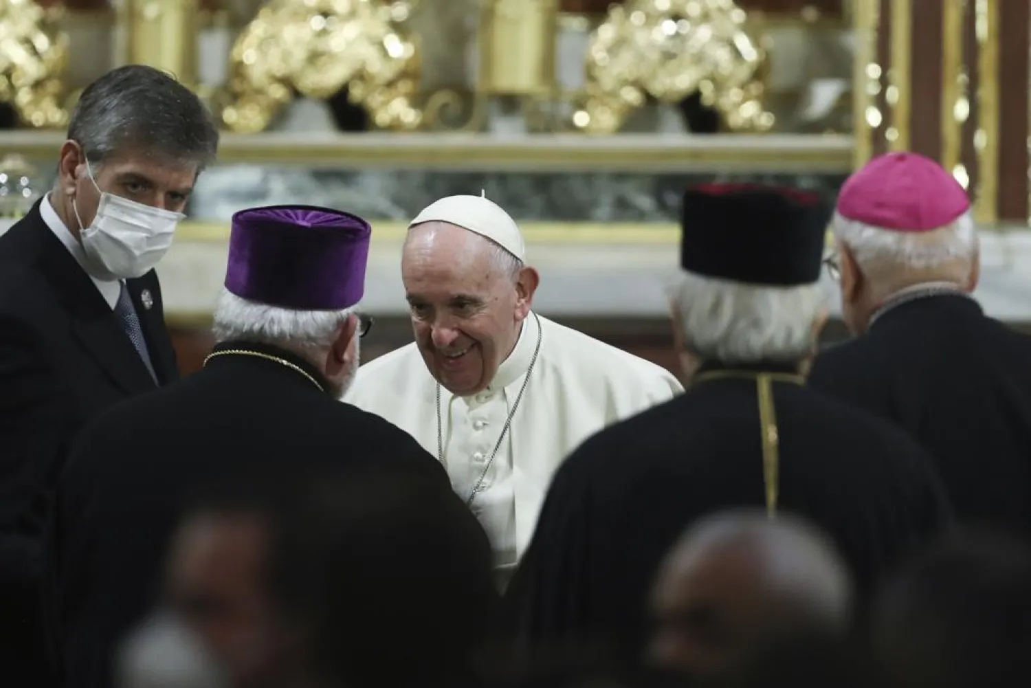 Pope Francis attends a meeting with members of the religious community at the Cathedral of Saint Dionysius in Athens, Greece, Saturday, Dec. 4, 2021. (Costas Baltas/Pool via AP)
