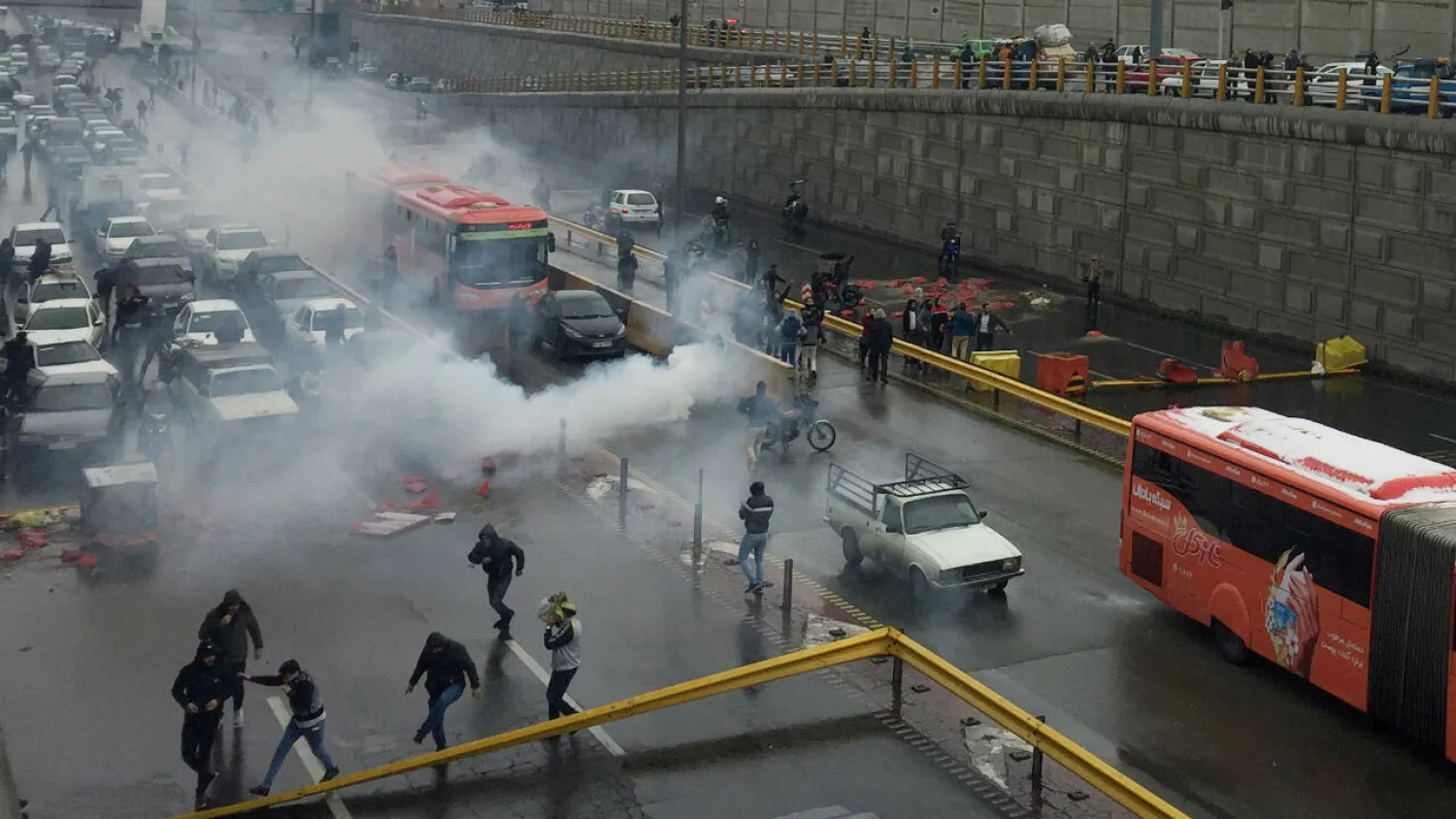 Riot police disperse protesters against increased gas prices on a highway in Tehran, Iran, on November 16, 2019. Nazanin Tabatabaee/West Asia News Agency, via REUTERS