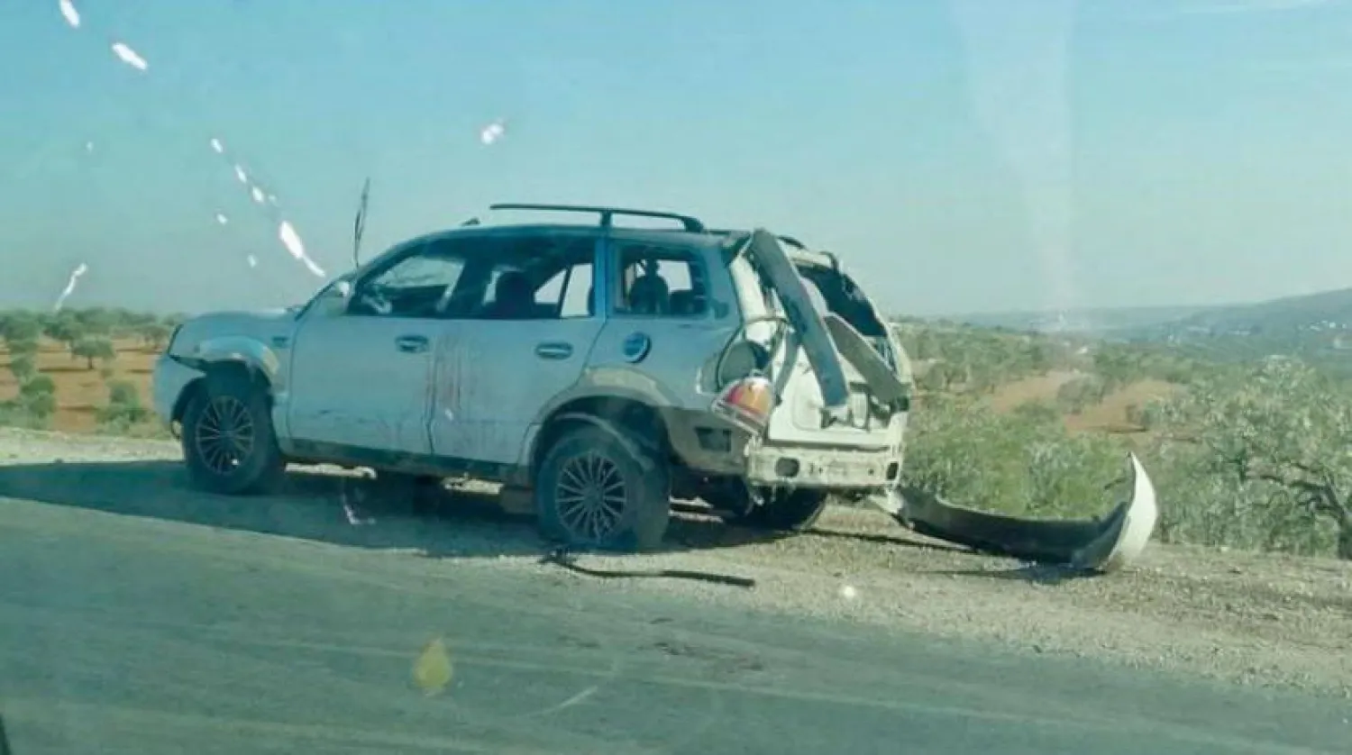 Ahmad Qassoum's vehicle that was damaged in a US drone strike in Idlib's countryside on Friday. Asharq Al-Awsat