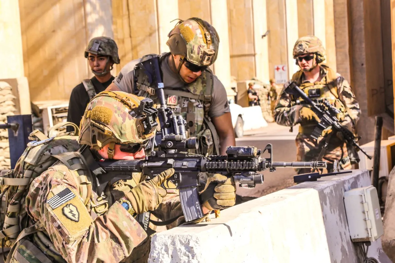 US.Army soldiers from 1st Brigade, 25th Infantry Division, Task Force-Iraq, man a defensive position at Forward Operating Base Union III in Baghdad, Iraq, December 31, 2019. Reuters