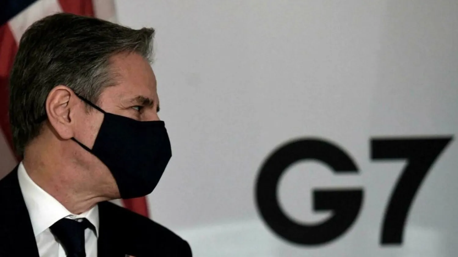 U.S. Secretary of State Antony Blinken wears a face mask as he holds a bilateral meeting with Australia's Foreign Minister Marise Payne on the first day of the G7 foreign ministers summit in Liverpool, Britain December 11, 2021. © Olivier Douliery/Pool via Reuters
