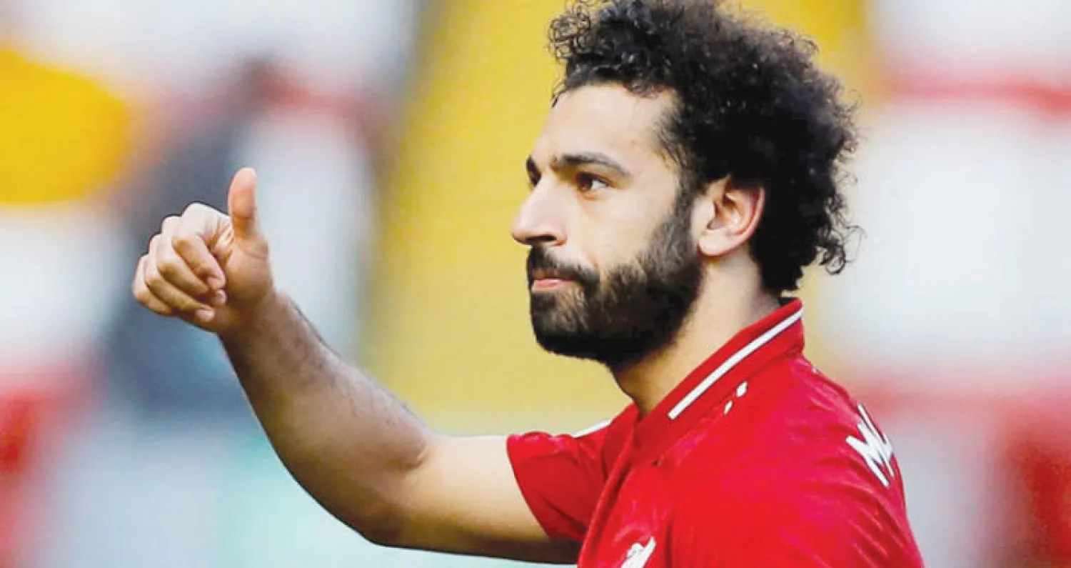 صلاح هداف ليفربول والدوري الإنجليزي قد يغيب عن منتخب مصر (رويترز)