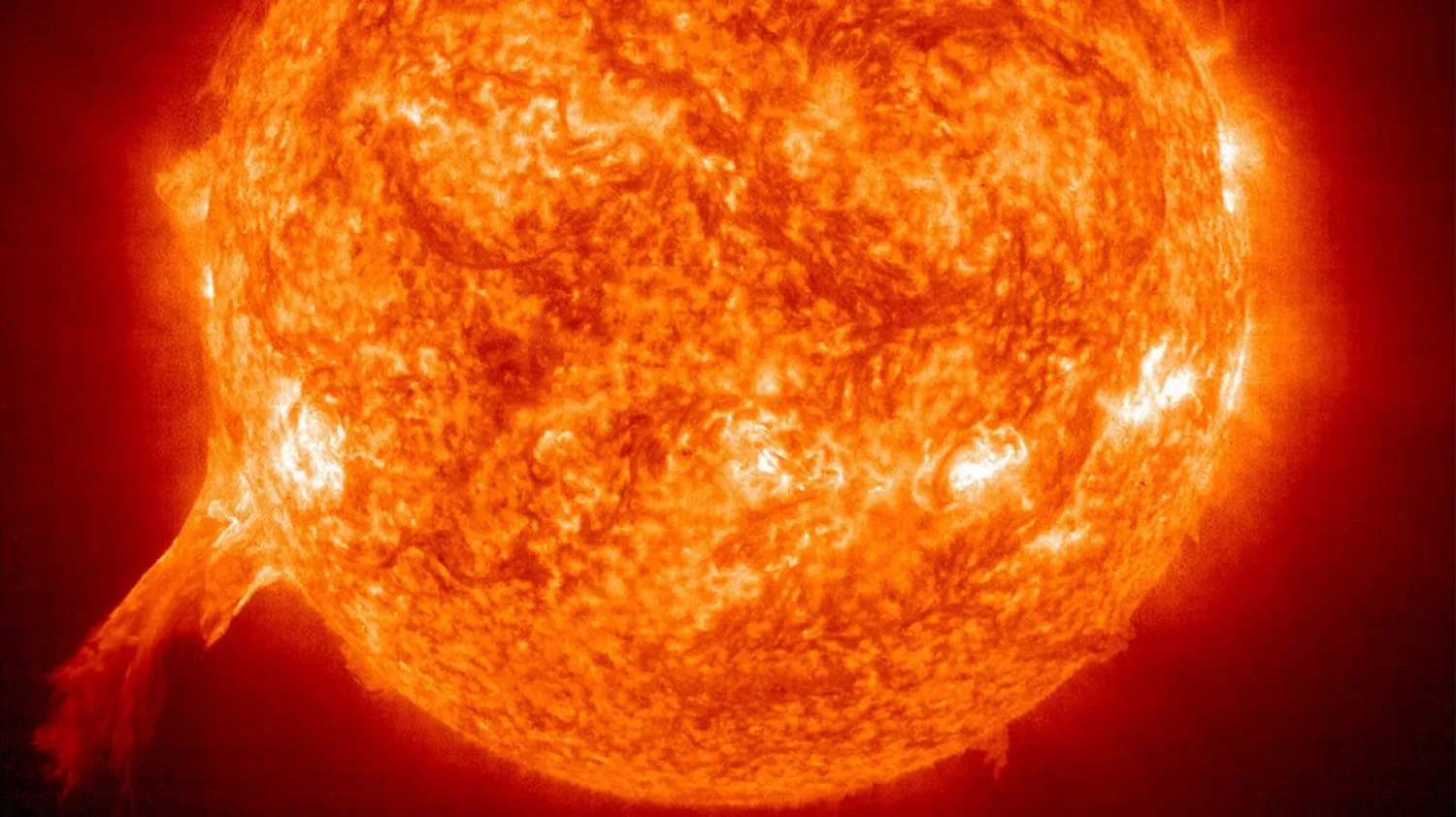 A massive solar eruption, more than 30 times the length of Earth's diameter, blasted away from the Sun on July 1, 2002, and a satellite captured graphic images of the event. (Reuters)
