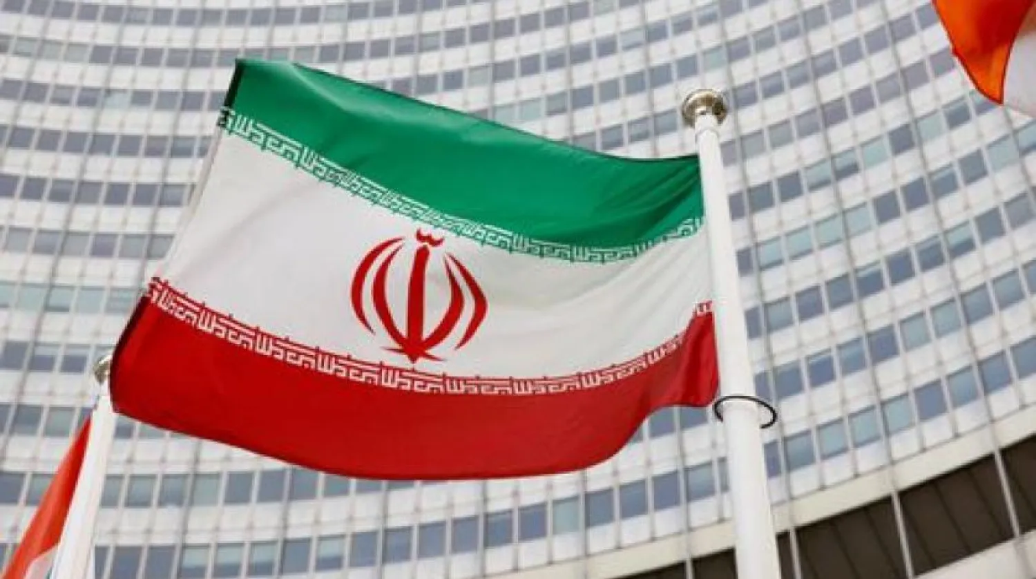FILE PHOTO: The Iranian flag waves in front of the International Atomic Energy Agency (IAEA) headquarters in Vienna, Austria May 23, 2021. REUTERS/Leonhard Foeger
