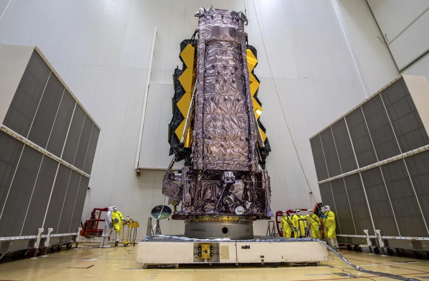 FILE - In this Saturday, Dec. 11, 2021 photo released by the European Space Agency, NASA's James Webb Space Telescope is secured on top of the Ariane 5 rocket that will launch it to space from Europe's Spaceport in French Guiana. (M.Pedoussaut/ESA via AP, File)
