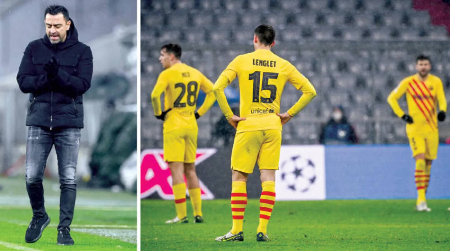 لحظات الانكسار في فريق برشلونة تكررت كثيراً لكن أقساها كان الخروج من دوري الأبطال بالهزيمة أمام البايرن (إ.ب.أ)  -  تشافي اعترف بواقع برشلونة المؤلم (أ.ف.ب)