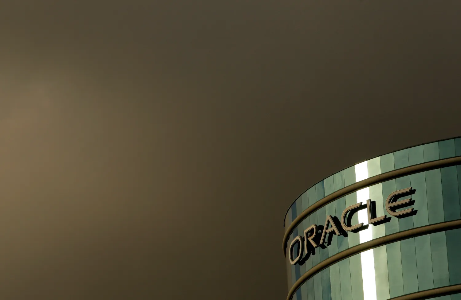 The company logo is shown at the headquarters of Oracle Corporation in Redwood City, California. REUTERS/Robert Galbraith/File Photo