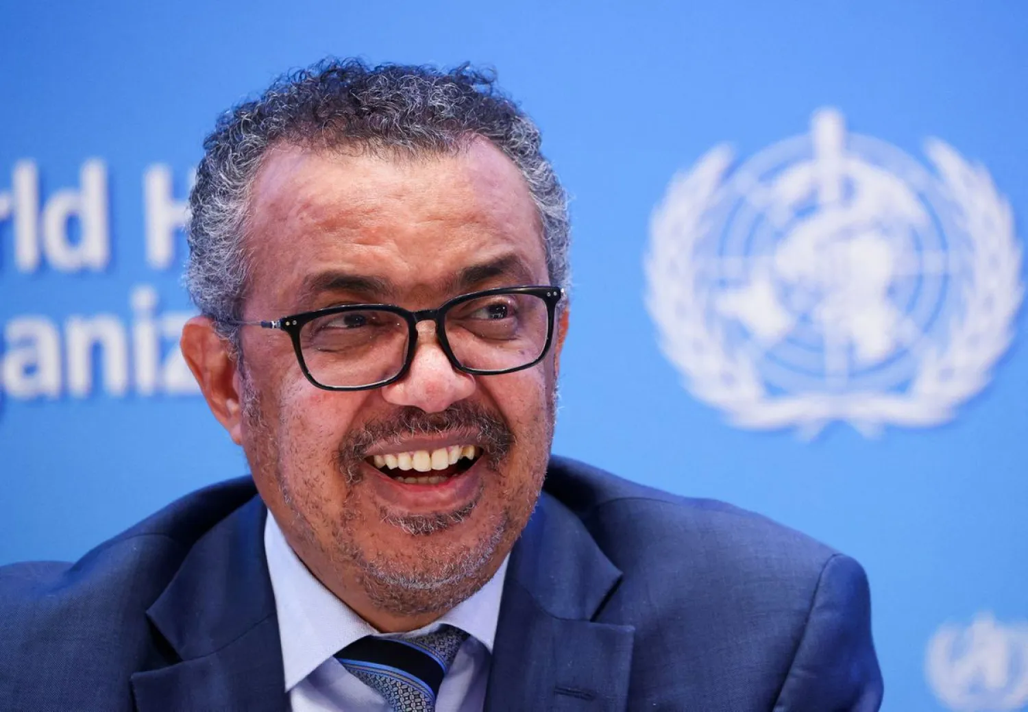 Tedros Adhanom Ghebreyesus, Director-General of the World Health Organization (WHO), reacts during a news conference in Geneva, Switzerland, December 20, 2021. REUTERS/Denis Balibouse
