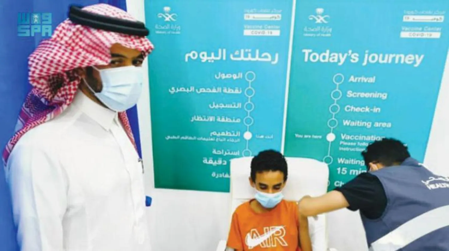 A child receiving his 1st jab during a vaccination campaign in Saudi Arabia last July (SPA) 
