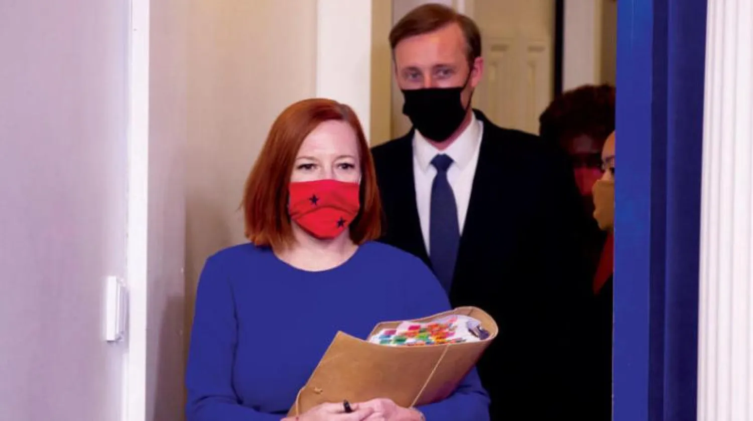 White House spokesperson Jen Psaki and National Security Advisor Jake Sullivan on the sidelines of a press conference at the White House December 7, 2021. (EPA)