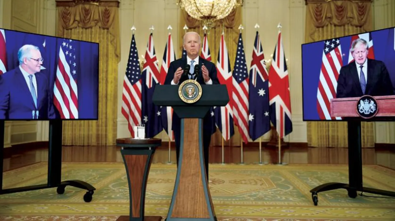 ABD Başkanı Joe Biden, İngiltere Başbakanı Boris Johnson ve Avustralya Başbakanı Scott Morrison ile 15 Eylül'de gerçekleştirilen sanal toplantıdan bir kare (AFP)