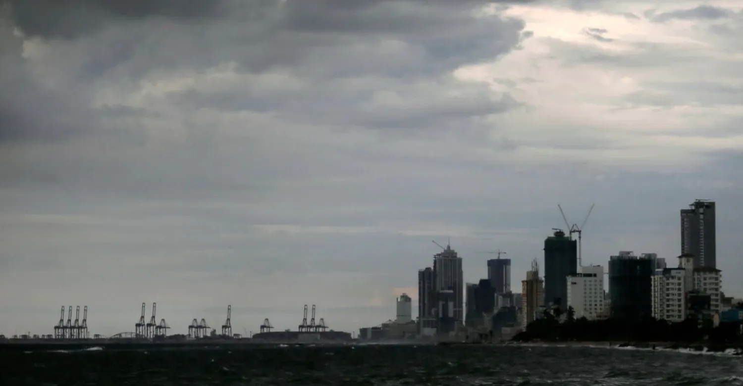 A general view of the main business district as rain clouds gather above in Colombo, Sri Lanka, November 17, 2020. REUTERS/Dinuka Liyanawatte