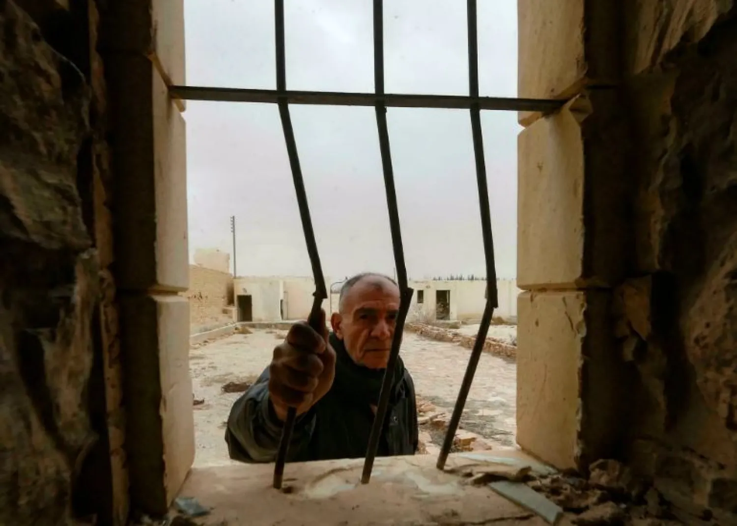 Matanios Dalloul, 62, assesses the damage in the fifth-century Syriac Catholic monastery of Mar Elian, or Saint Elian LOUAI BESHARA AFP
