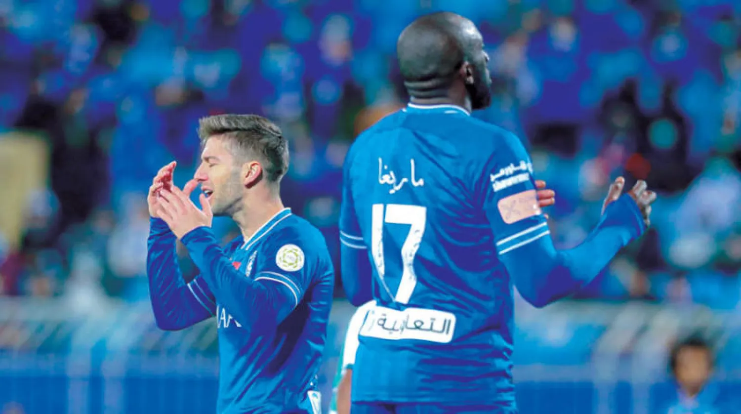 ماريغا وفييتو يتحسران بعد نهاية مباراة الفتح (تصوير: علي الظاهري)