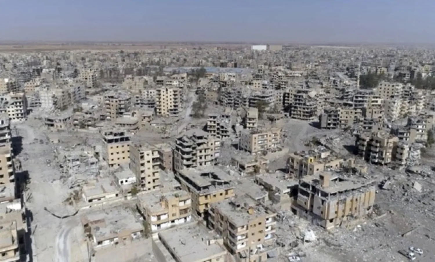 This Oct. 19, 2017, frame grab made from drone video shows damaged buildings in Raqqa, Syria. Reuters
