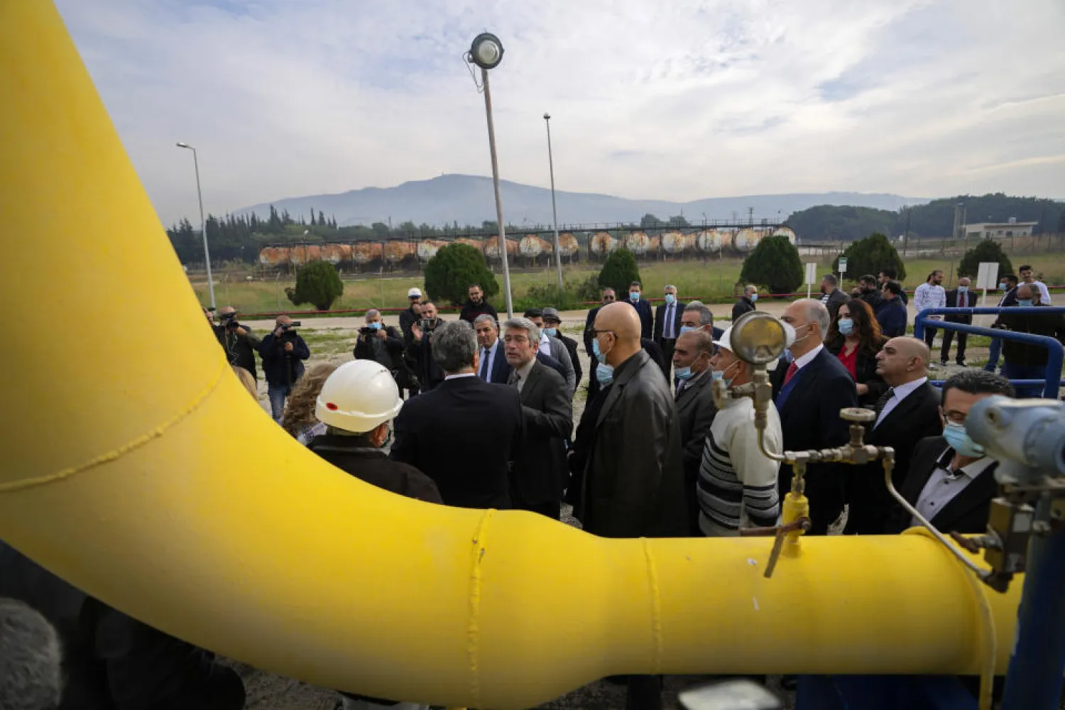 Lebanese Energy Minister Walid Fayad, center left, tours the Beddawi oil facility in the northern city of Tripoli, Lebanon, Tuesday, Dec. 28, 2021. (AP)