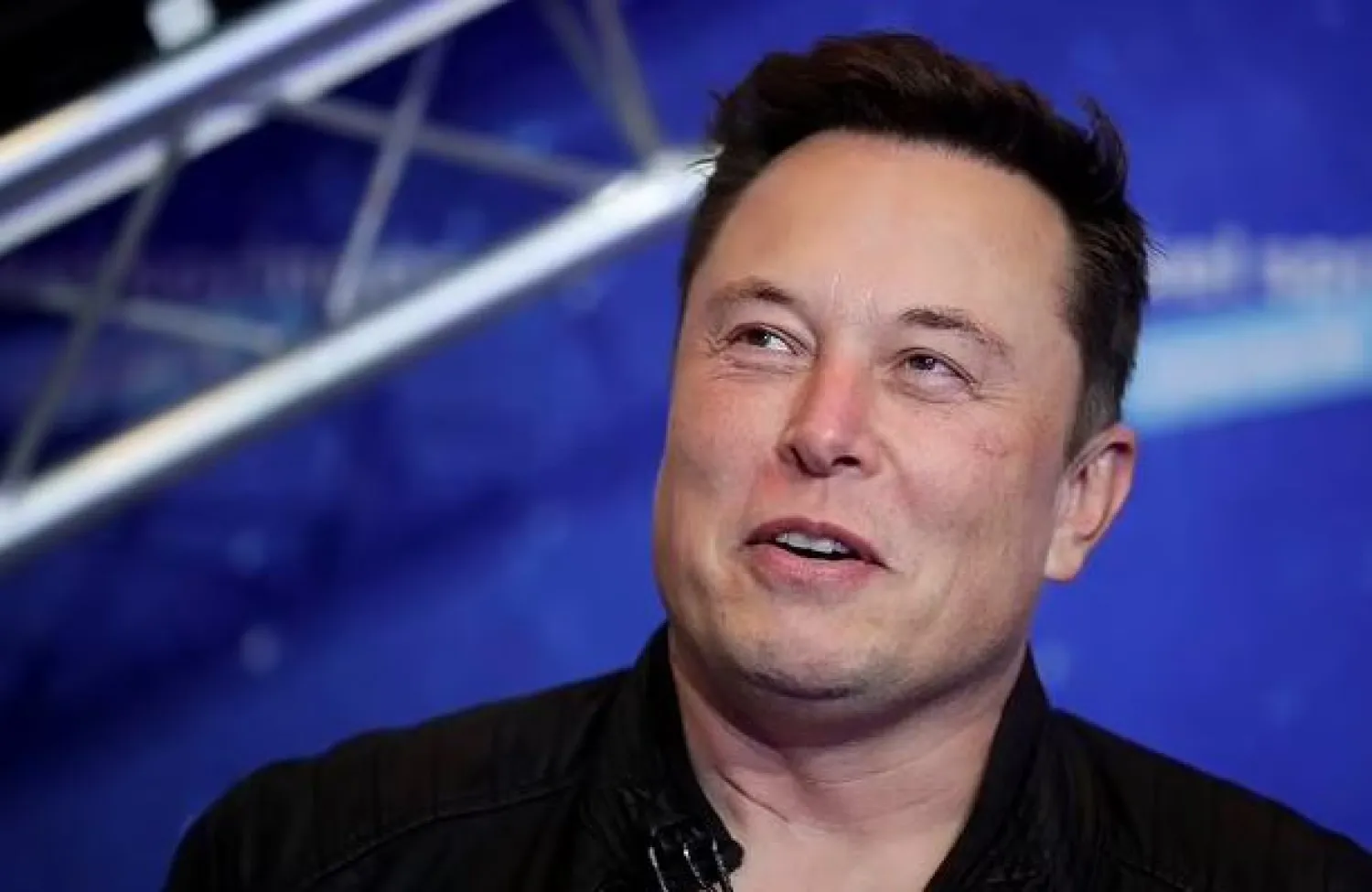 FILE - In this Dec. 1, 2020, file photo, SpaceX owner and Tesla CEO Elon Musk arrives on the red carpet for the Axel Springer media award in Berlin. China is calling on the United States to protect a Chinese space station and its three-member crew after Beijing complained that satellites launched by Elon Musk's SpaceX nearly struck the station. A foreign ministry spokesman accused Washington on Tuesday, Dec. 28, 2021, of ignoring its treaty obligations to protect the safety of the Tiangong station's three-member crew following the July 1 and Oct. 21 incidents. (Hannibal Hanschke/Pool Photo via AP, File)

