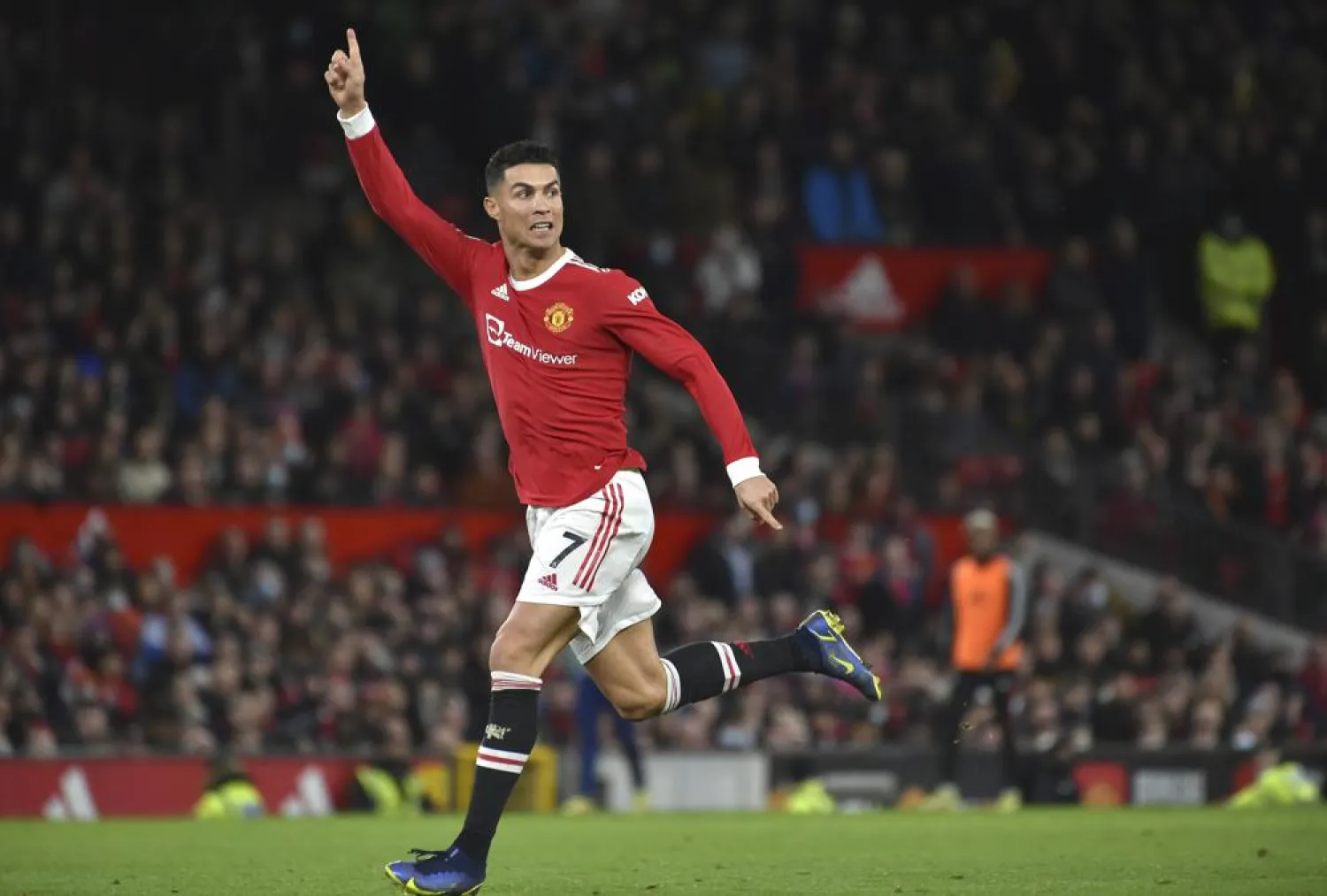 Manchester United's Cristiano Ronaldo in action during the Premier League match between Manchester United and Burnley at Old Trafford in Manchester, England, Thursday, Dec. 30, 2021. (AP)