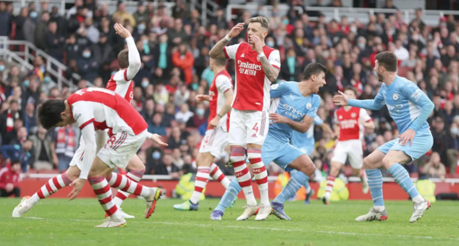 أفراح في مانشستر سيتي وأحزان في آرسنال (رويترز)