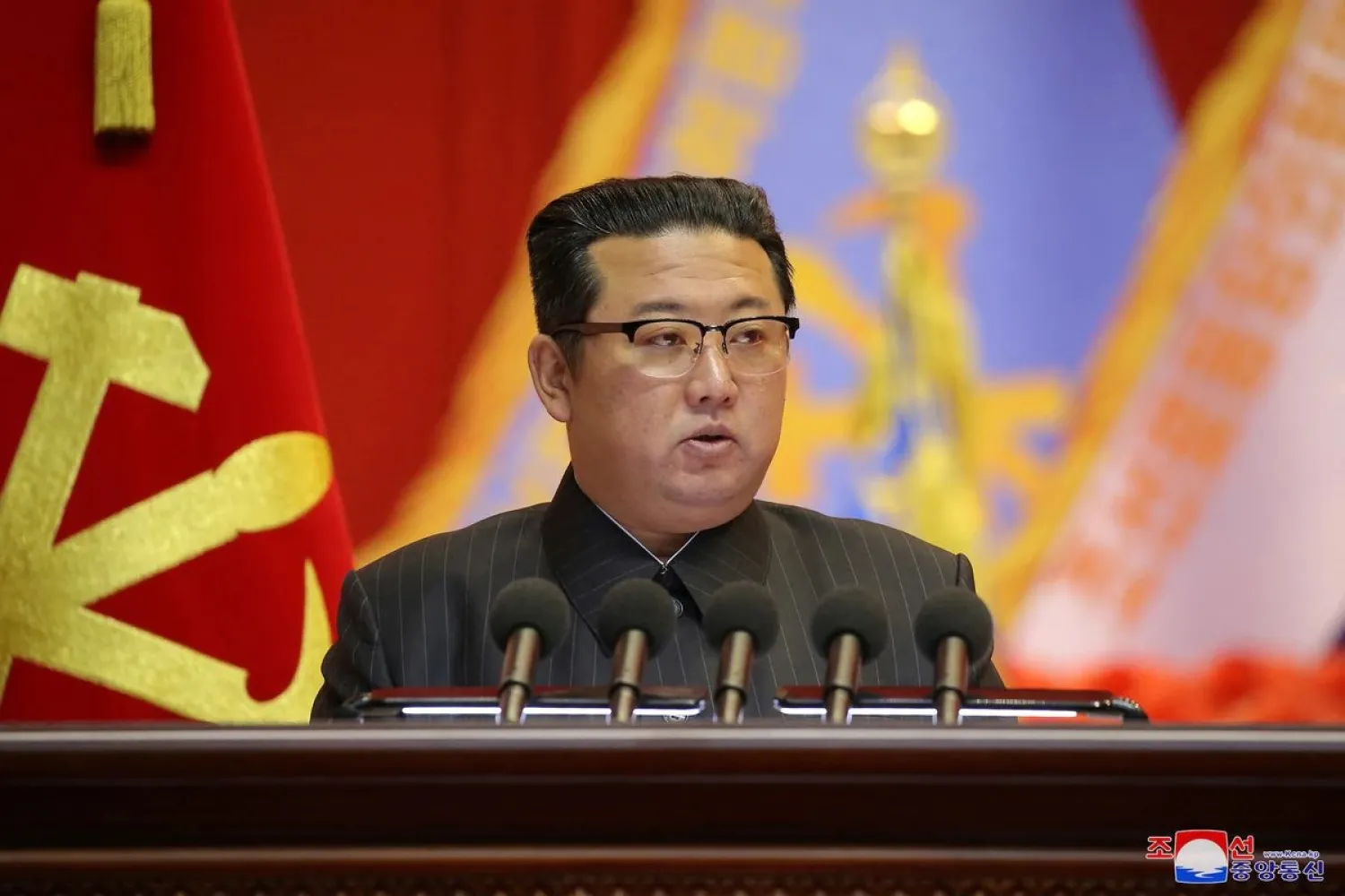 North Korean leader Kim Jong Un speaks during the Eighth Conference of Military Educationists of the Korean People's Army at the April 25 House of Culture in Pyongyang, North Korea in this undated photo released on December 7, 2021. KCNA via Reuters