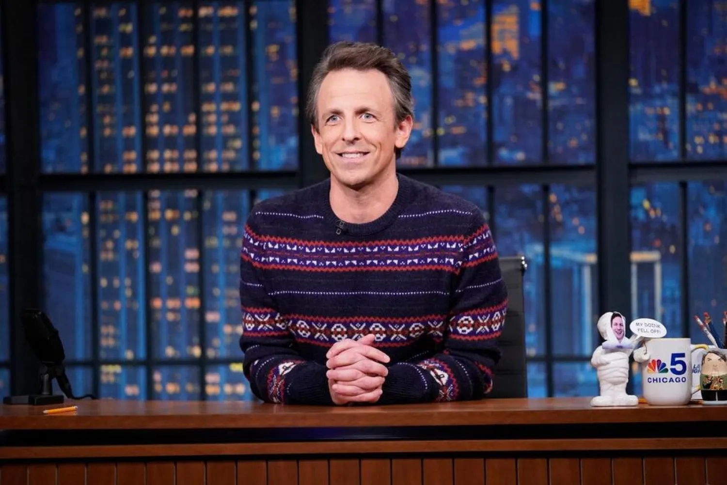 This image released by NBC shows Seth Meyers on "Late Night with Seth Meyers" in New York on Dec. 16, 2021. (NBC via AP)