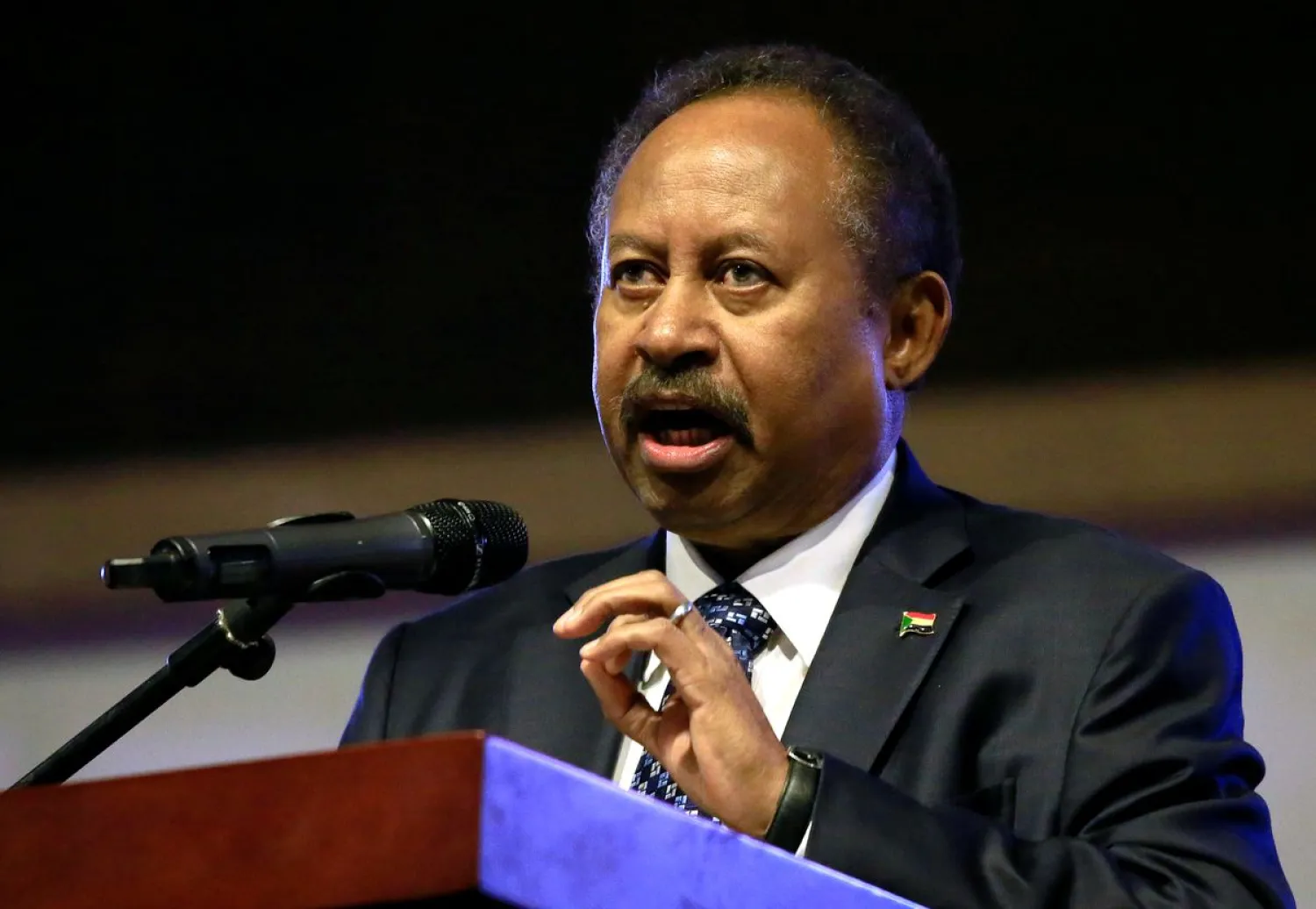 Prime Minister Abdalla Hamdok addresses people at the Friendship Hall in Khartoum, Sudan December 25, 2019. Picture taken December 25, 2019. (Reuters)