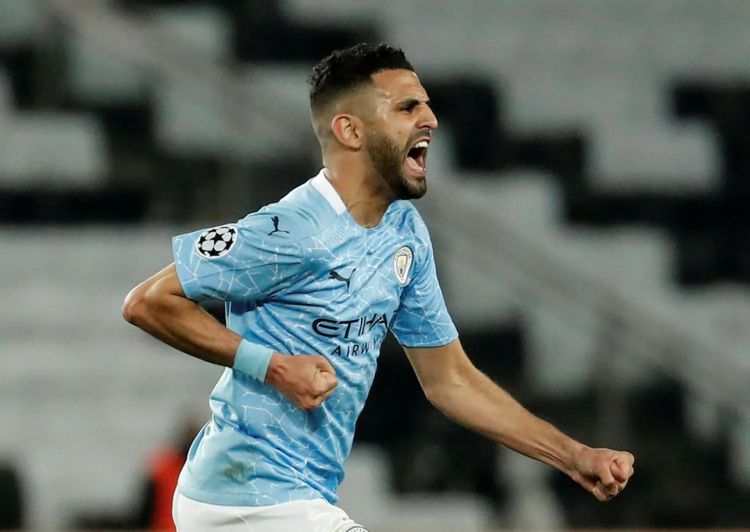 Soccer Football - Champions League - Semi Final First Leg - Paris St Germain v Manchester City - Parc des Princes, Paris, France - April 28, 2021 Manchester City's Riyad Mahrez celebrates scoring their second goal REUTERS/Benoit Tessier