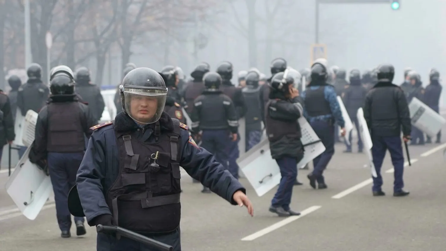  Police fired stun grenades and tear gas at a crowd of several thousand protesters in Almaty. (AFP)